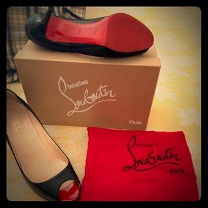 Christian Louboutin Open-Toe Platform Pumps.